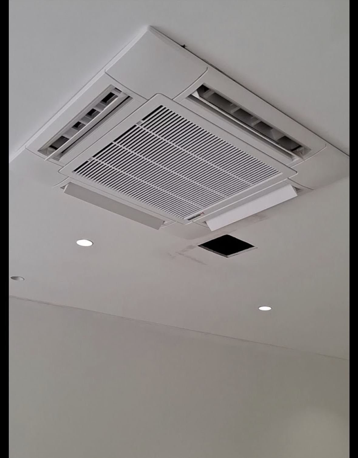 Newly installed ceiling cassette air conditioning unit